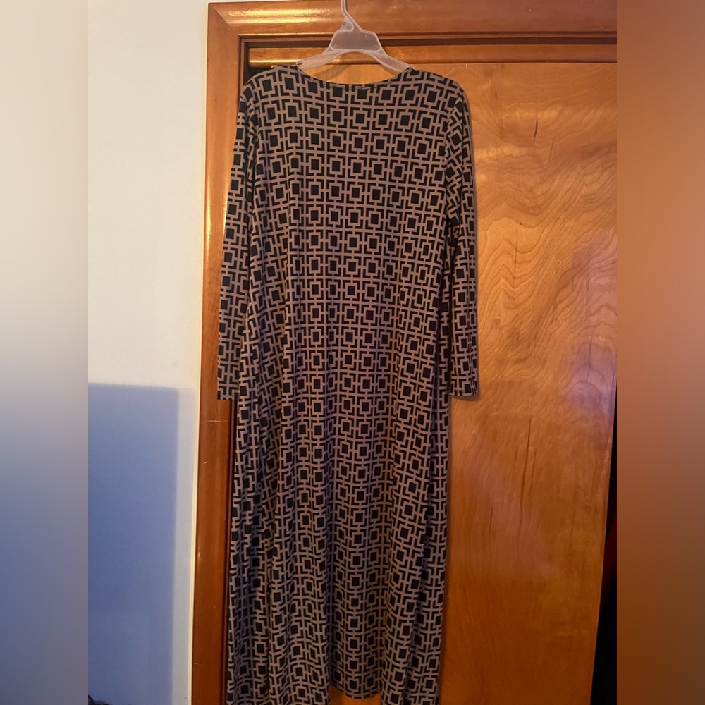 Jumpsuit with long cover all . Worn once.